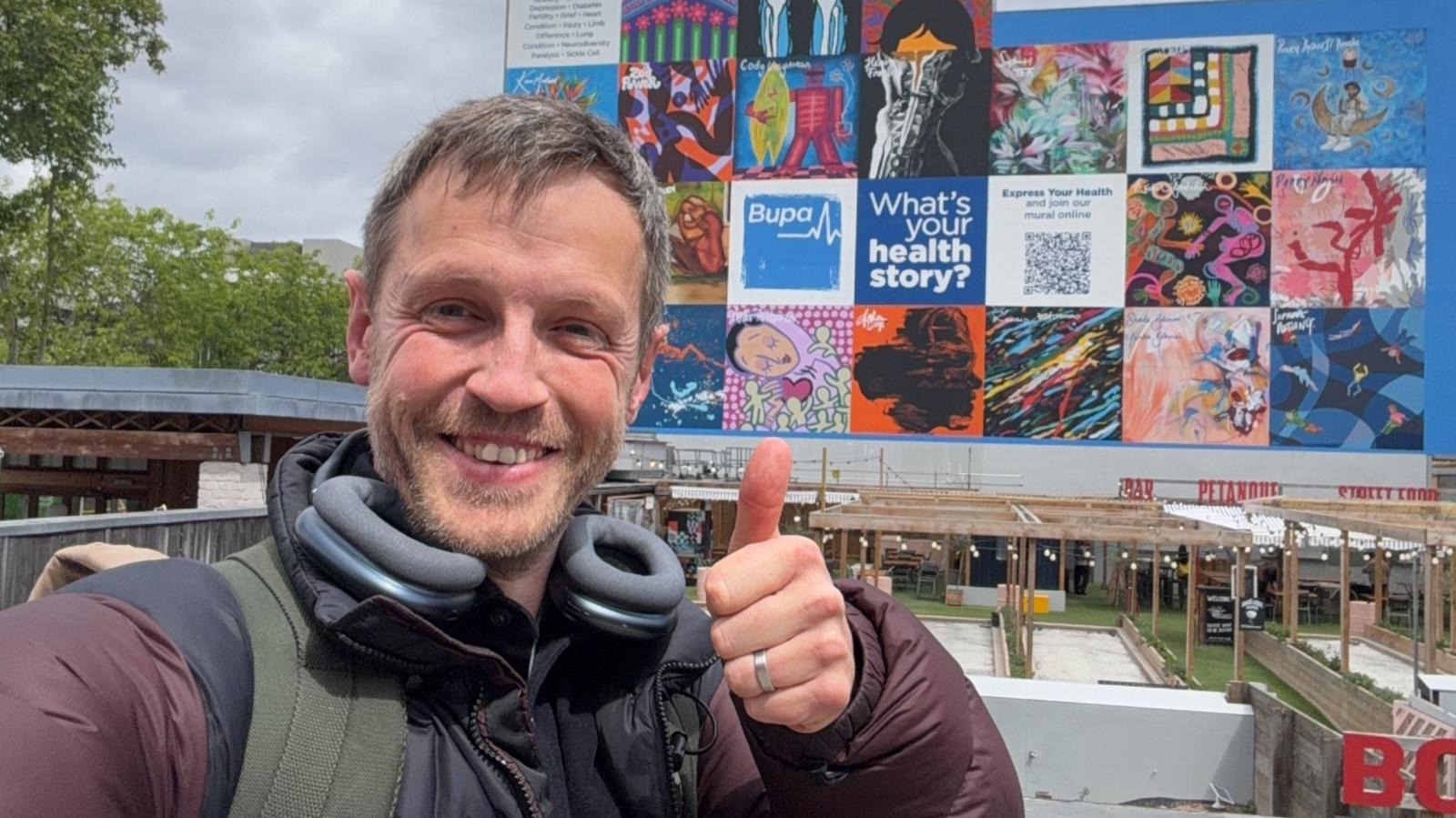 Phil in front of the Waterloo Bridge mural